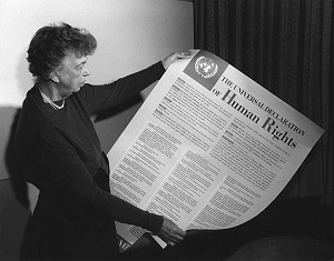 Eleanor Roosevelt hold a copy of the United Nations Universal Declaration of Human Rights